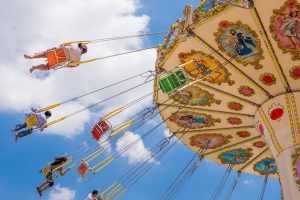 Children In An Amusement Park