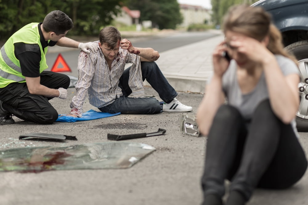 Man Covered In Blood After A Car Has Hit Him