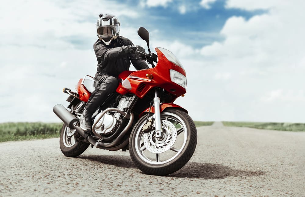 Man On A Red Motorcycle