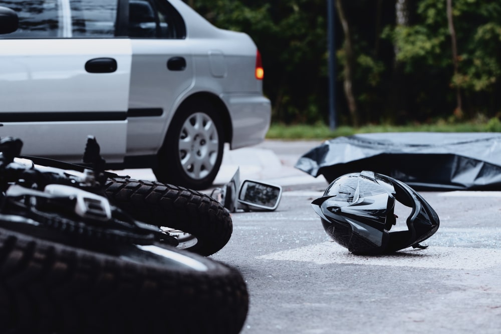 Motorcycle Helmet On The Ground In A Car Crash Scene