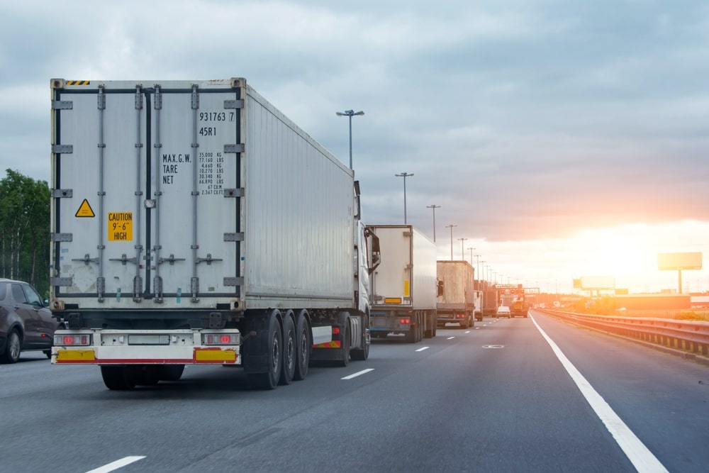 Multiple Truck Lined Up On A Highway