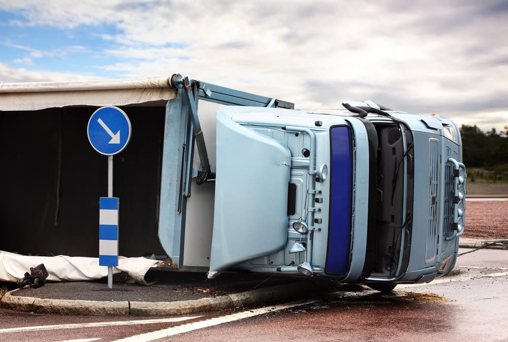 White Truck Fallen On Its Side