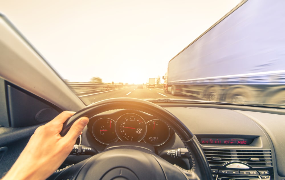 Point Of View From A Drivers Position Of A Truck On A Highway